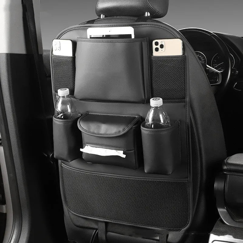 Black leather car seat back storage bag hanging from a headrest