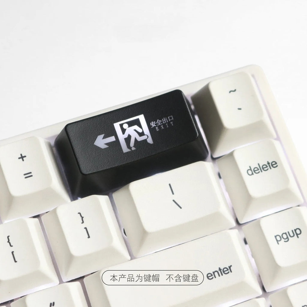 Transparent mechanical keyboard key cap with raised safety evacuation exit text