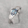 Geometric ellipse women's ring with inlaid zircon stone in white gold plating