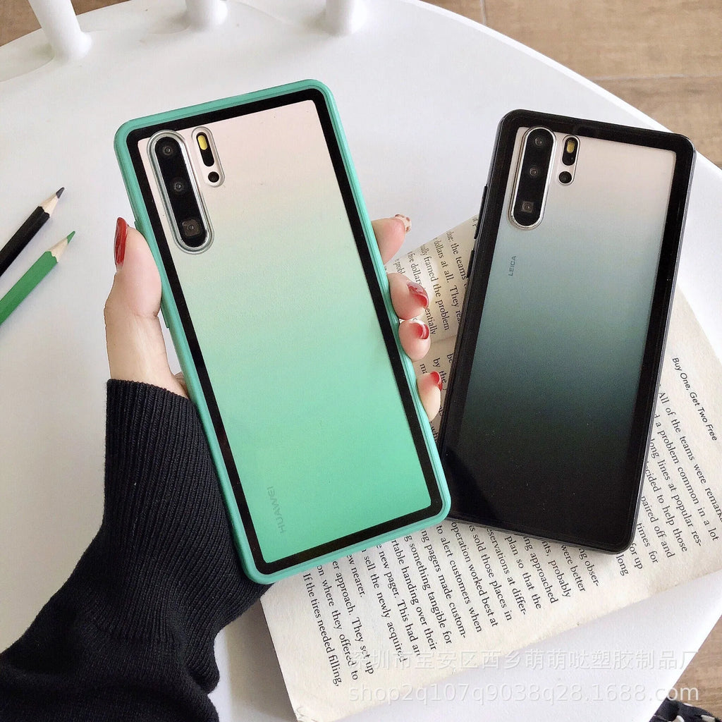 Rainbow coloured dual-material phone case for Huawei mobile phones, shown in black, green, orange and pink options.