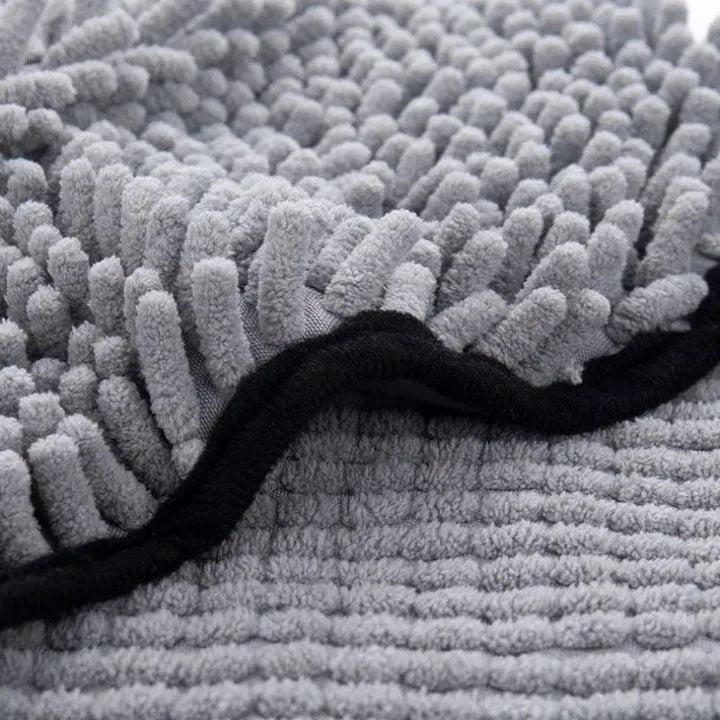 Blue pet bath towel measuring 62 by 23 cm for drying dogs and cats