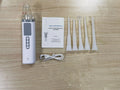 Milky white tonsil stone extractor oral cleaning tool with complete dental hygiene components
