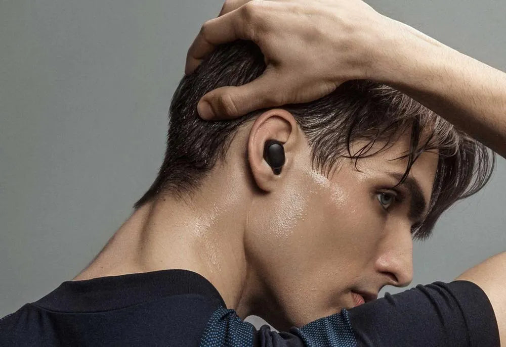Redmi AirDots 2 true wireless black earbuds with a charging case.