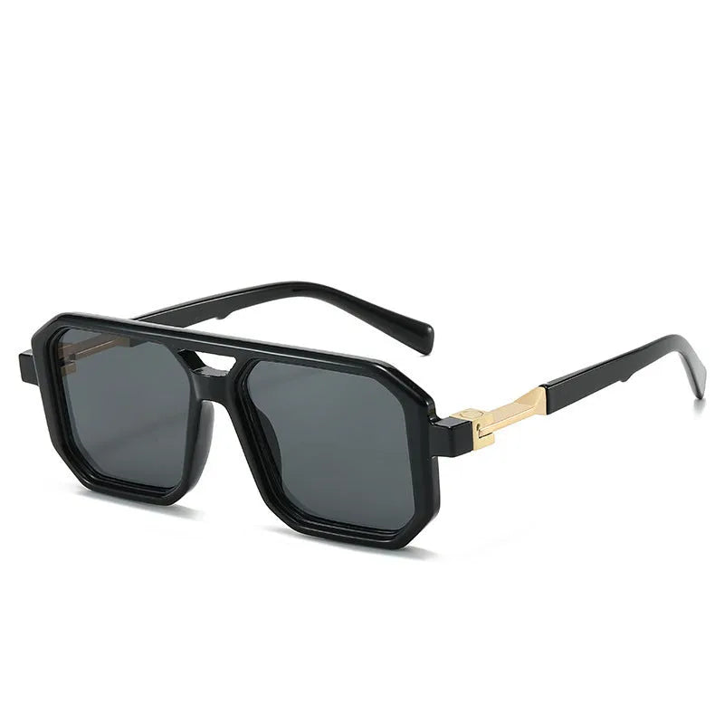 Retro double beam pilot sunglasses showing front design and metal spring hinge, in a black frame with gray lenses.