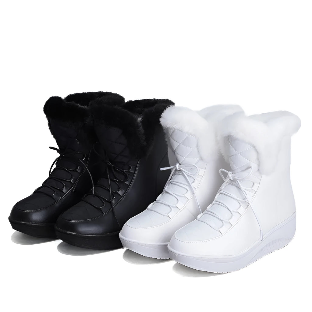 Black women's lace-up winter boots with platform sole on a white background