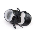 Vintage style baby walking shoes with soft soles and synthetic leather uppers in multiple colours