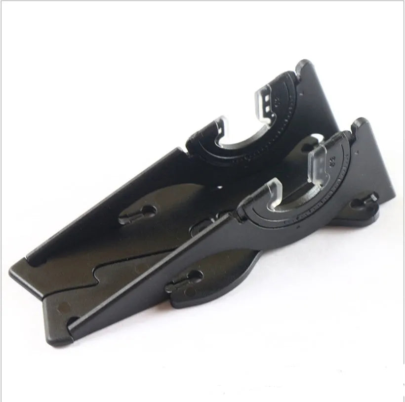 Black plastic lazy bracket mobile phone holder on a desktop