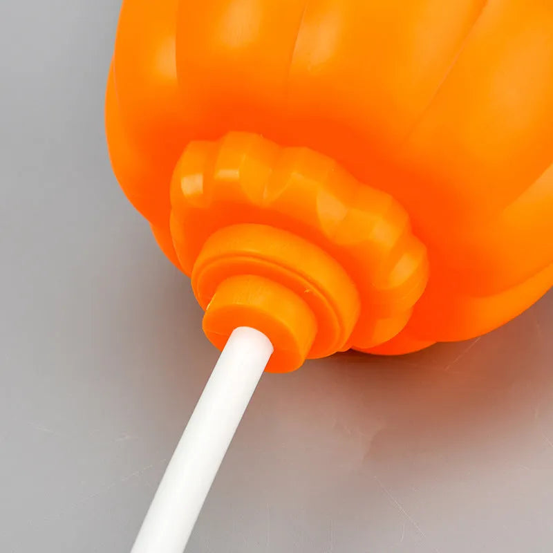 Plastic pumpkin decorative lamp with USB charging port in yellow or purple light options