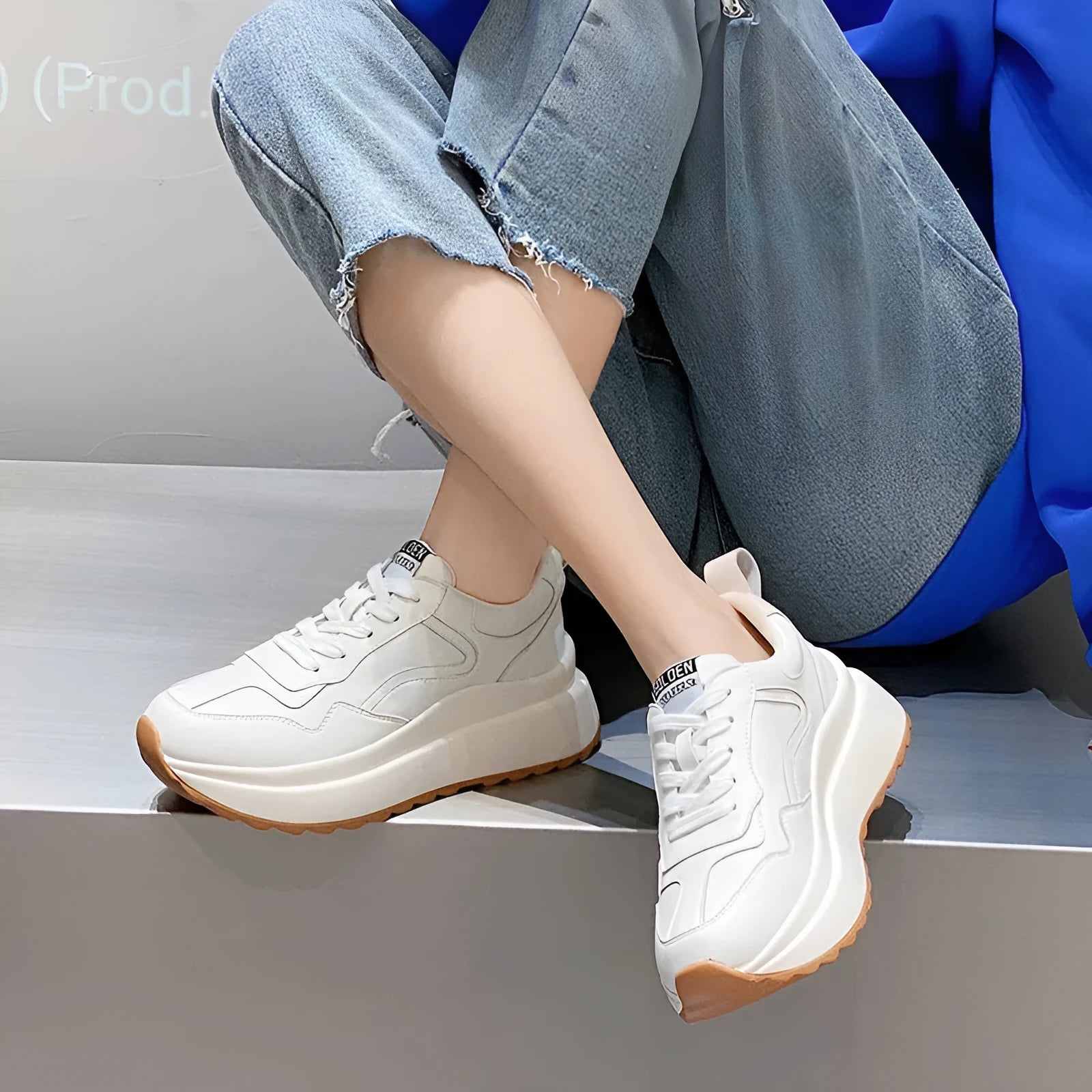 Beige women's low-top leather casual sports shoes with lace-up fastening and round toe.