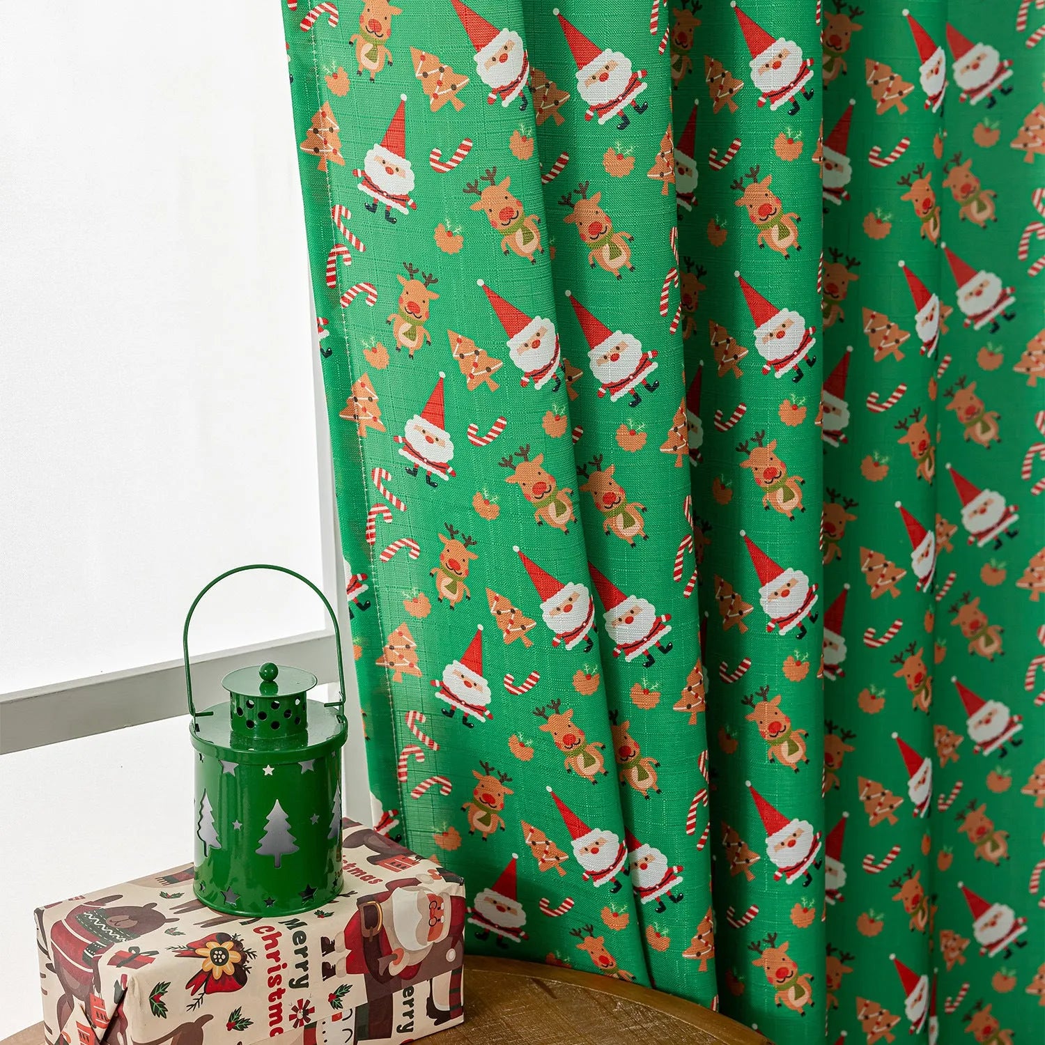 Green and red Christmas curtain with printed snowman and angel cartoon design