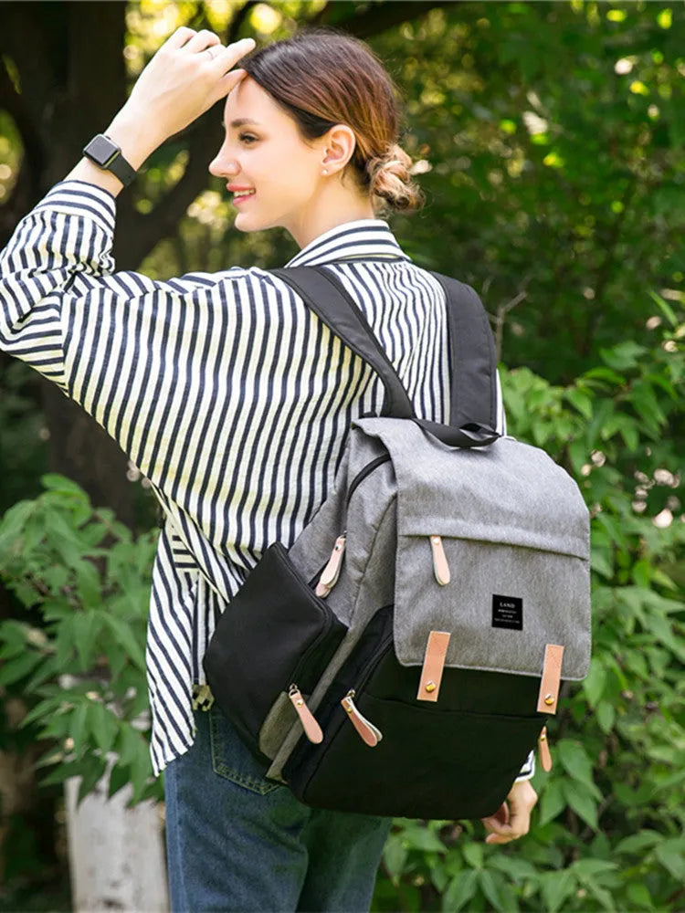 LAND Mommy large oxford cloth diaper backpack with changing mat, shown in grey colour.