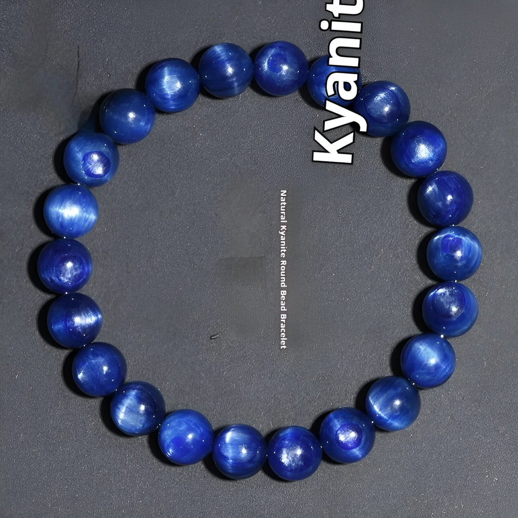 Geometric Ruyi design blue crystal ball bracelet with polished beads on a white background.