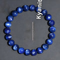 Geometric Ruyi design blue crystal ball bracelet with polished beads on a white background.
