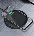 Black 10W 5W fast wireless phone charger on desk with slim 8mm profile