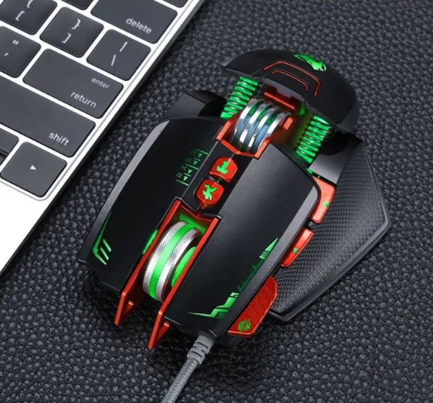 Thunder Wolf V9 black and grey wired gaming mouse with ergonomic shape and six buttons on a desk.