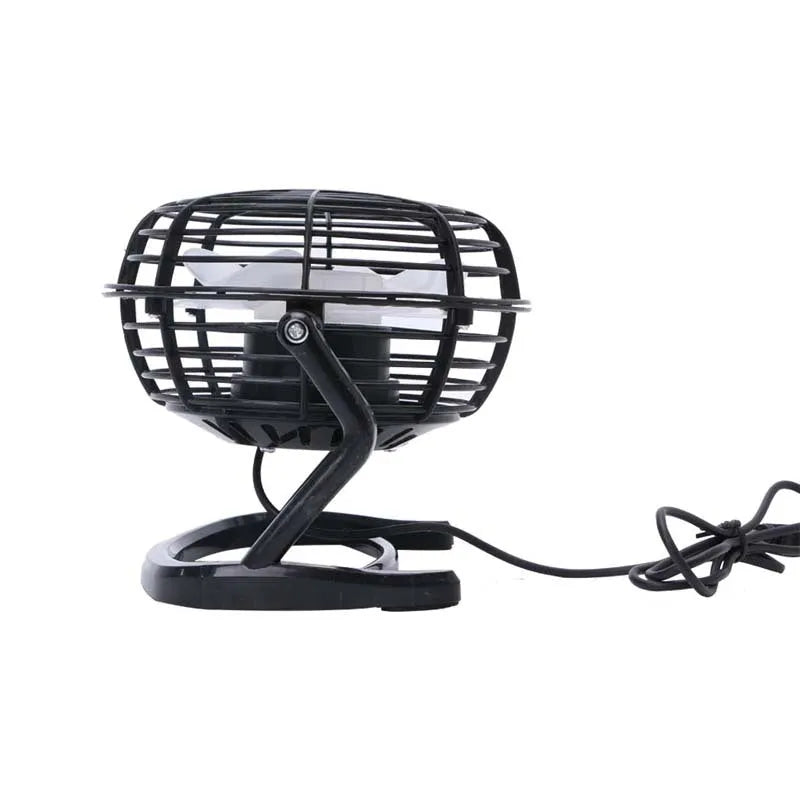 Black mini USB desktop fan with adjustable angle on wooden desk