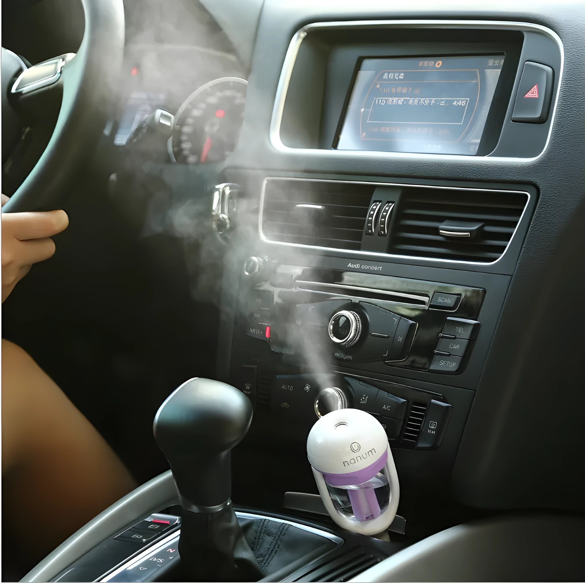 Portable car humidifier and air freshener diffuser with adjustable nozzle for vehicle use
