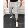 Lace-up casual jogging pants in solid light grey, nine points length, mid-waist, with adjustable front laces