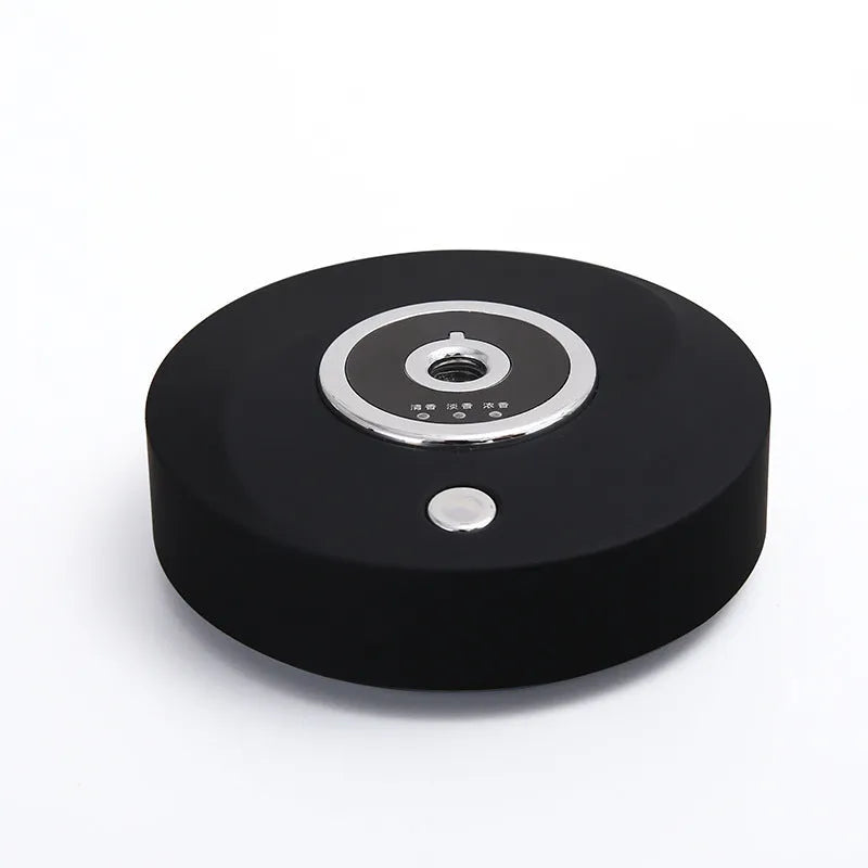 USB car diffuser with anti-slip pad in black plastic on vehicle dashboard