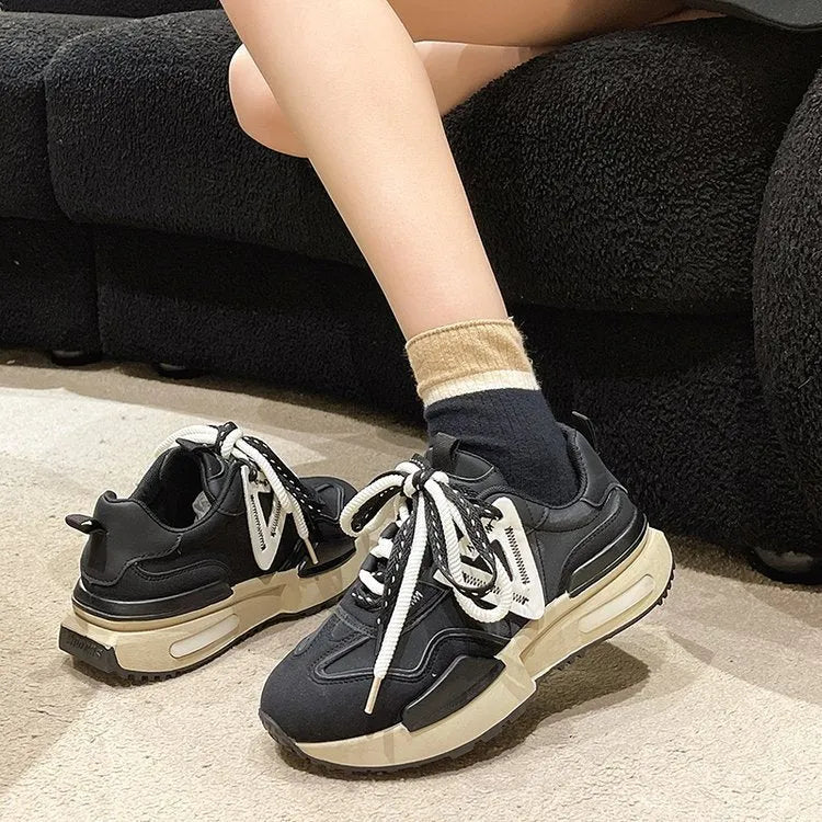 Women's black retro platform sports shoes with artificial PU upper and rubber sole
