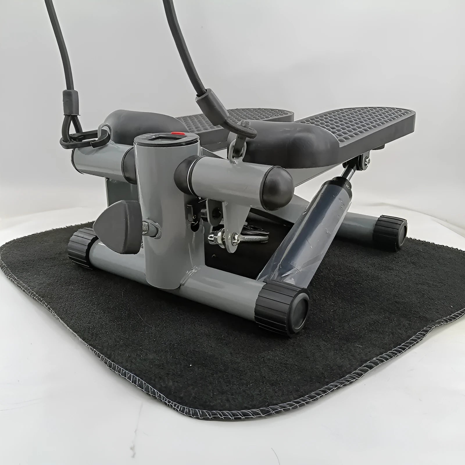 Silver grey hydraulic mini treadmill with pedal machine for home fitness workouts