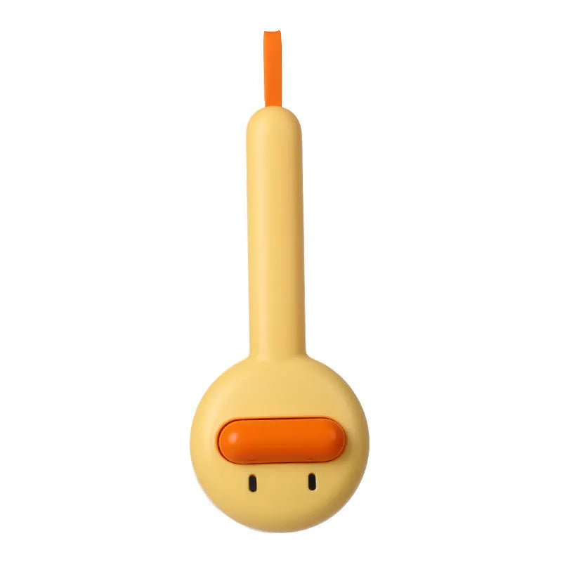 Small yellow duck-shaped pet grooming comb with needle teeth for cat and dog hair removal