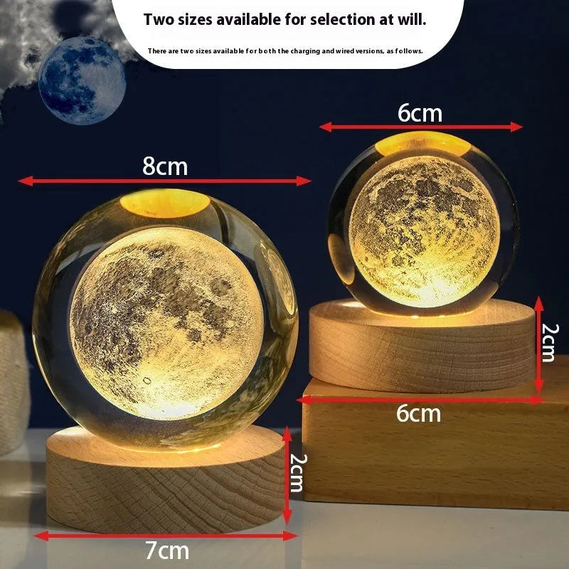 Clear crystal ball night lamp with warm light placed on base, 6cm or 8cm size option available