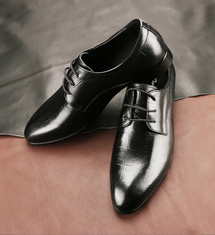 Men's black leather Derby shoes with checkered pattern detailing and pointed toe caps