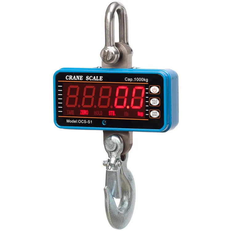Orange electronic crane scale with digital display, shown with a 500 kg maximum load capacity rating.