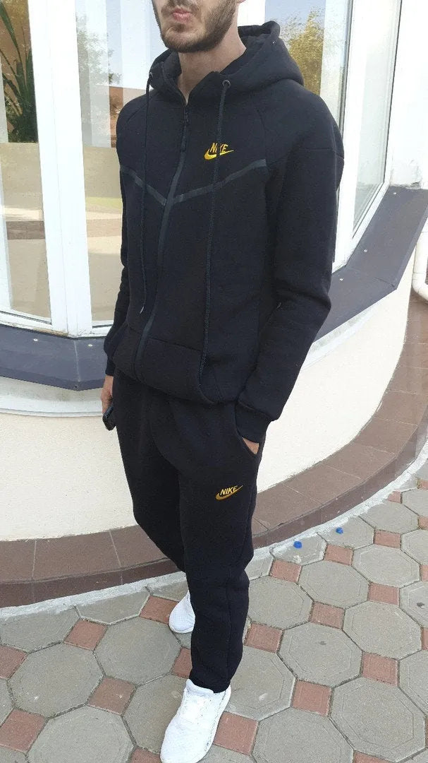Two-piece sports and leisure set in black spandex, front view, available in sizes S to XL