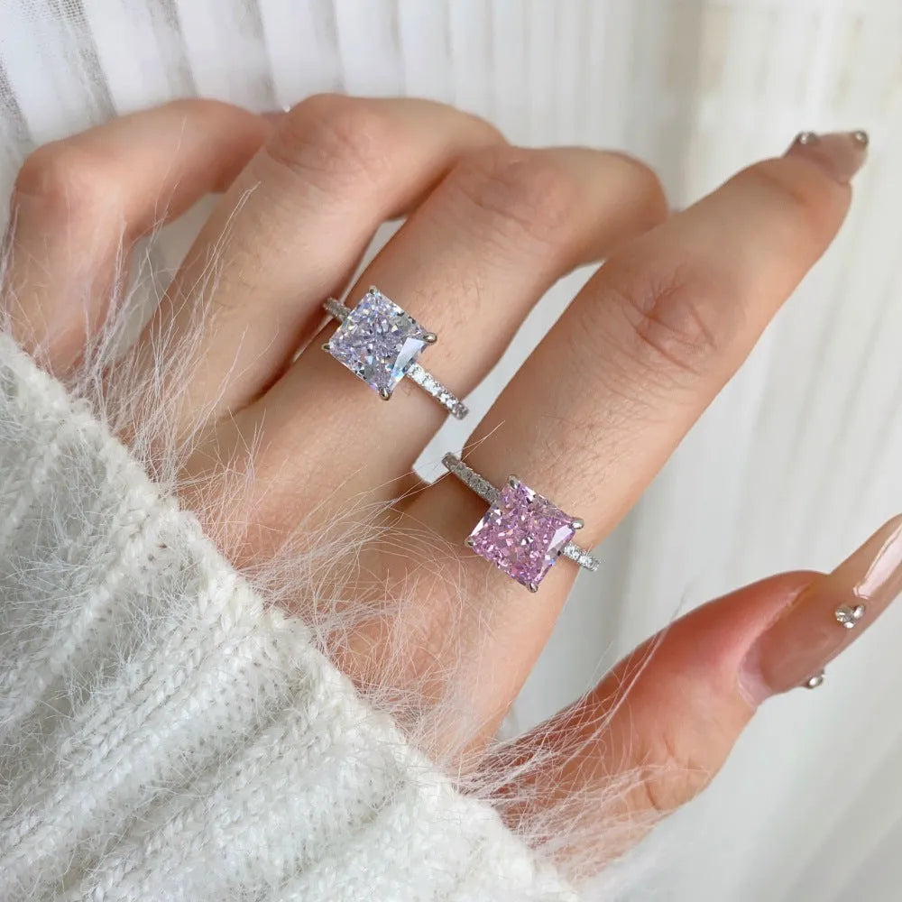 Sterling silver geometric cube sugar ring with ice flower cut cubic zirconia on silver background