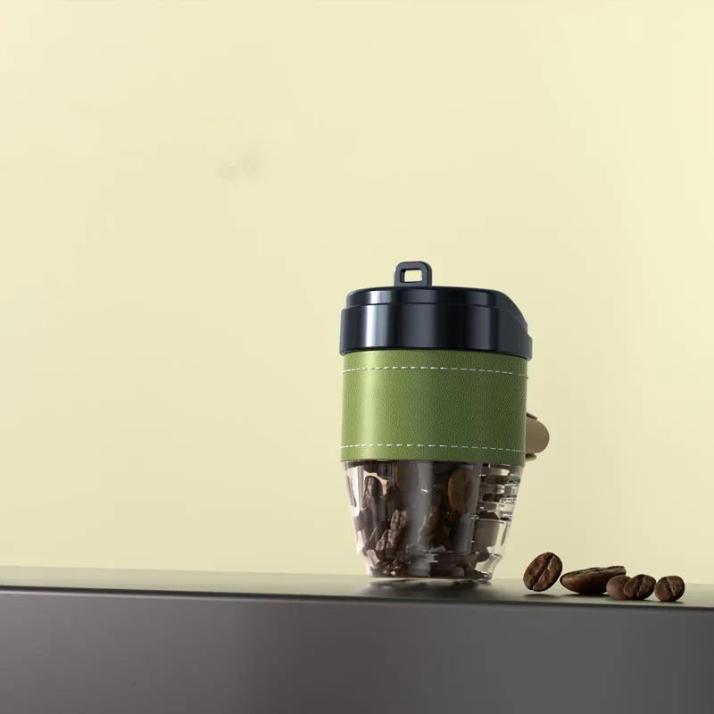 Solid plastic car air freshener shaped like a coffee cup in various colours.