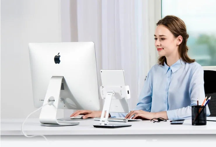 Foldable aluminium desktop phone and tablet holder showing rotation mechanism