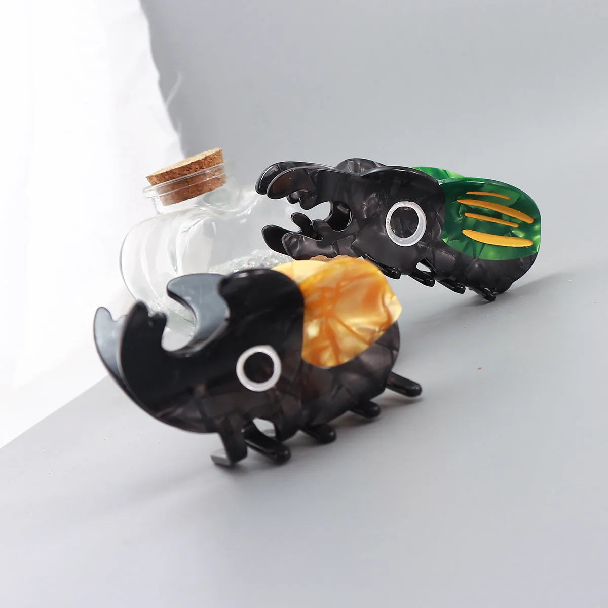 Handmade cellulose acetate beetle grip in cartoon style for insect biology observation
