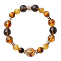 Unisex tiger-eye crystal bracelet with geometric yellow tower beads in 10mm or 12mm size options.