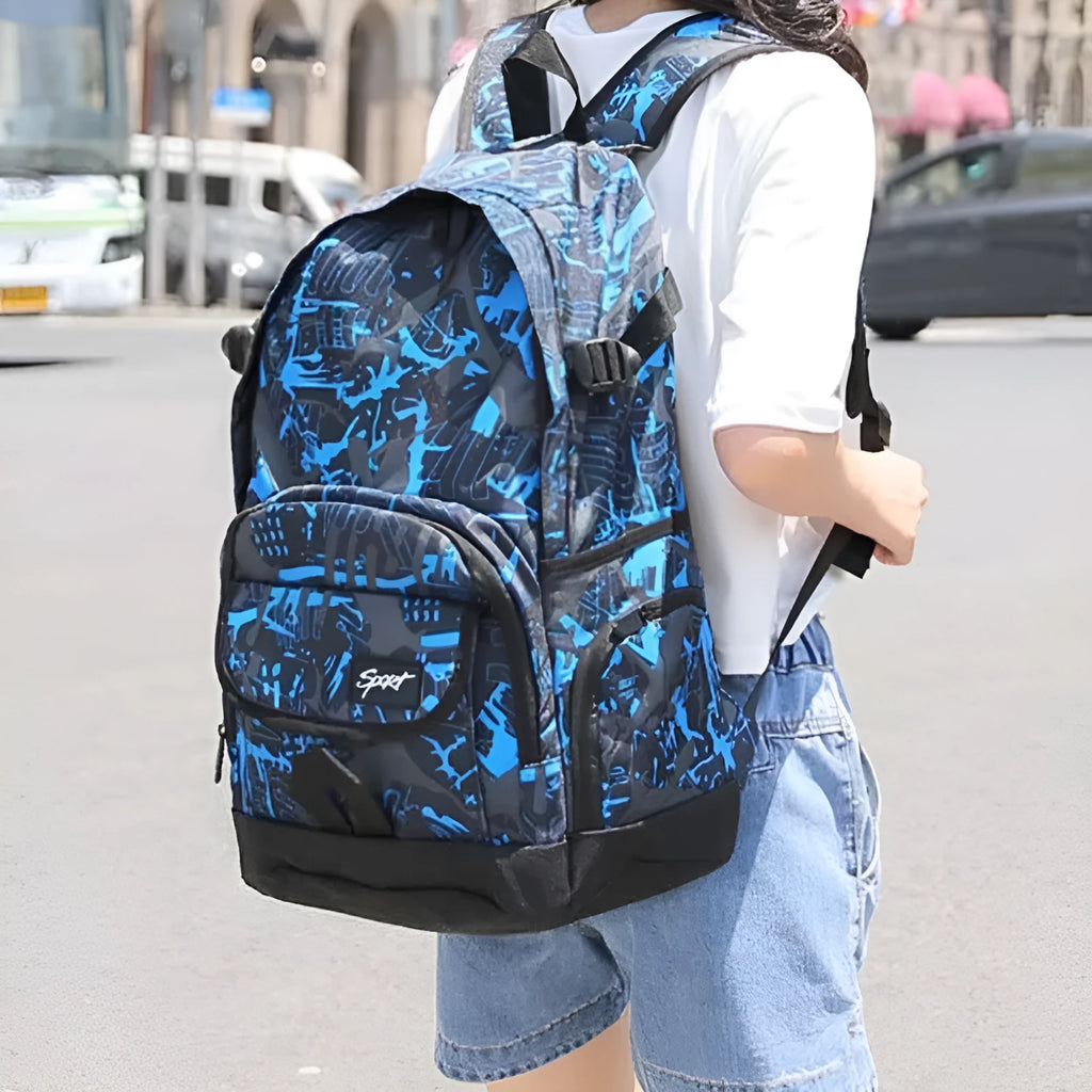 Classic red or blue nylon backpack with large main compartment for school and travel