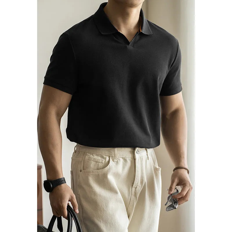 American-style short-sleeved polo shirt in a blue cotton-polyester blend on a hanger.