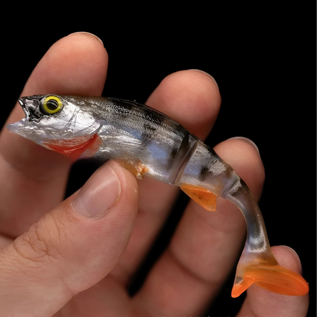 T-tail soft plastic fishing lure in fish colour pattern for sea fishing and catfish