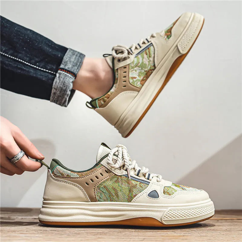 A pair of beige and Milan green canvas casual shoes with round toes and flat heels on a white background.