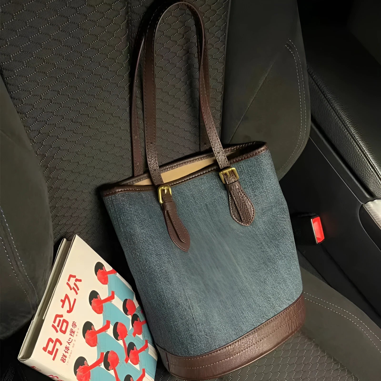 Denim colour patchwork retro bucket handbag with a single shoulder strap.