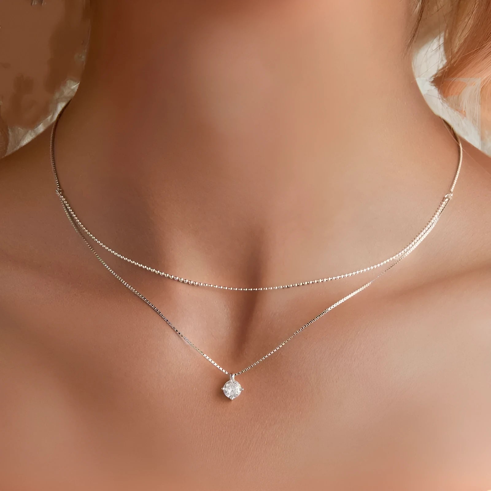 Women's sterling silver double-layer necklace with pearl chain and contemporary pendant