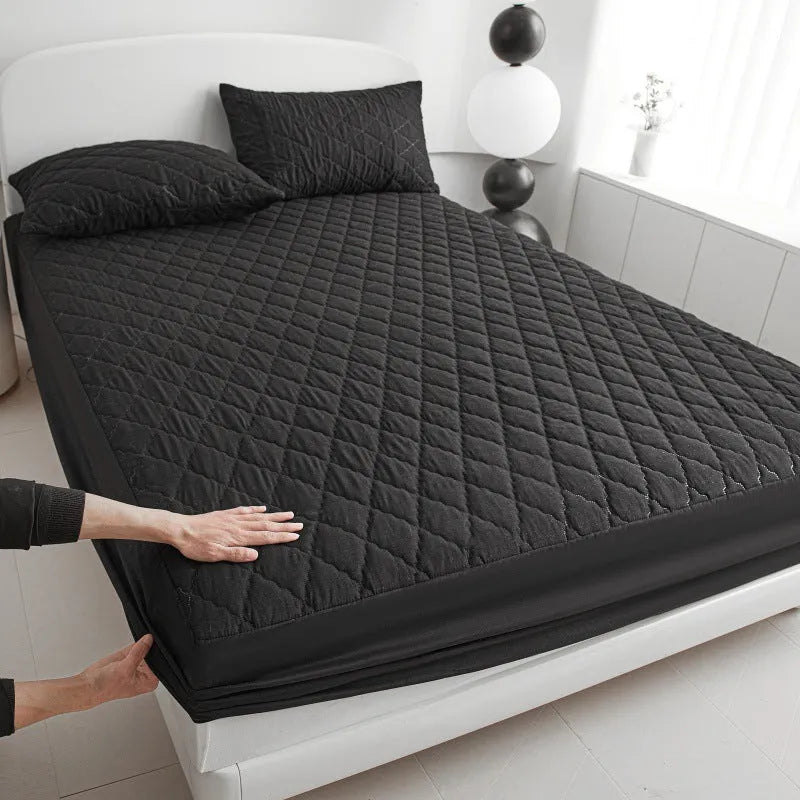 Diamond lattice quilted waterproof mattress protector set with fitted sheet and pillowcases in bamboo fibre