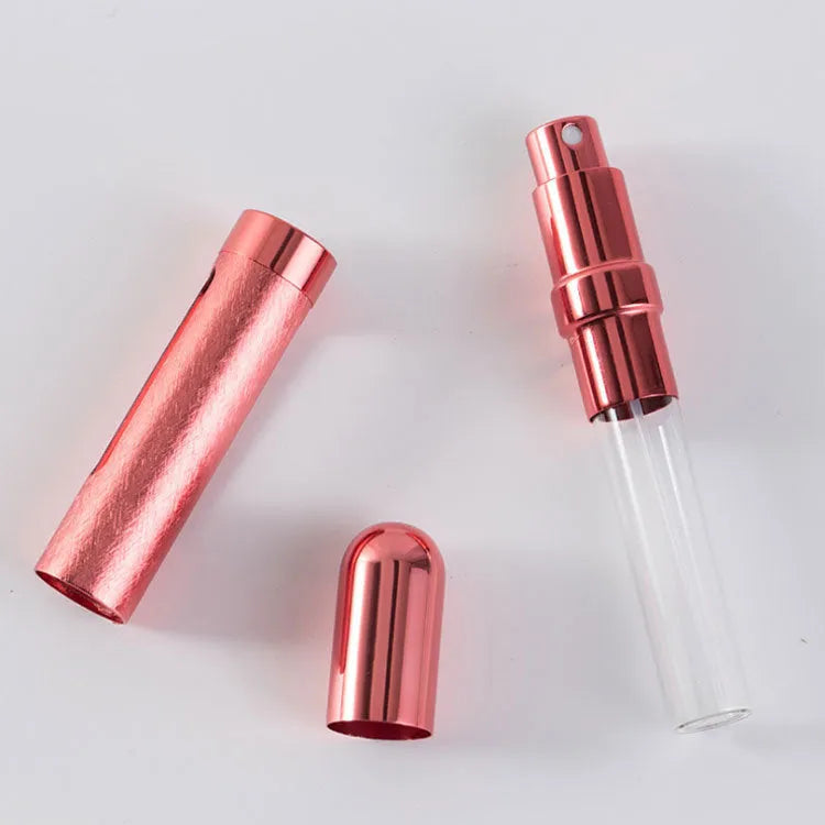 12ml aluminium portable perfume bottle in bullet shape with glass liner, shown in six colour options.