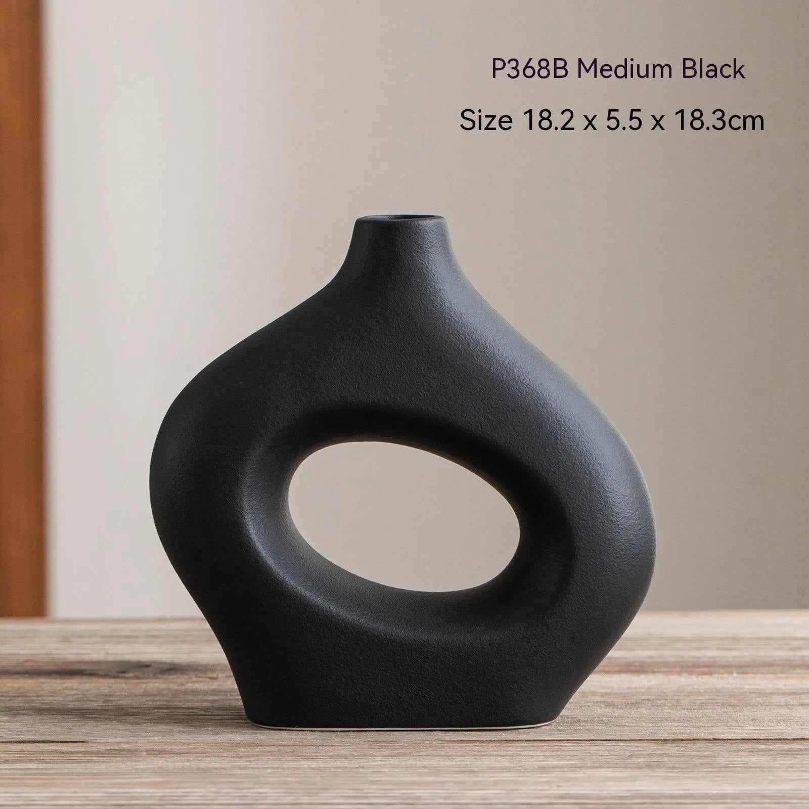 Ceramic circle vase second generation with coloured glaze finish, white large size, on a plain background