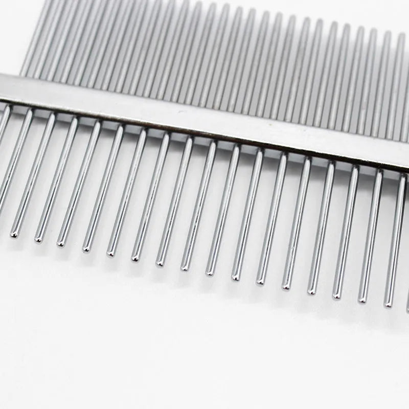 Double-row pet grooming comb with red handle and stainless steel needles on white background