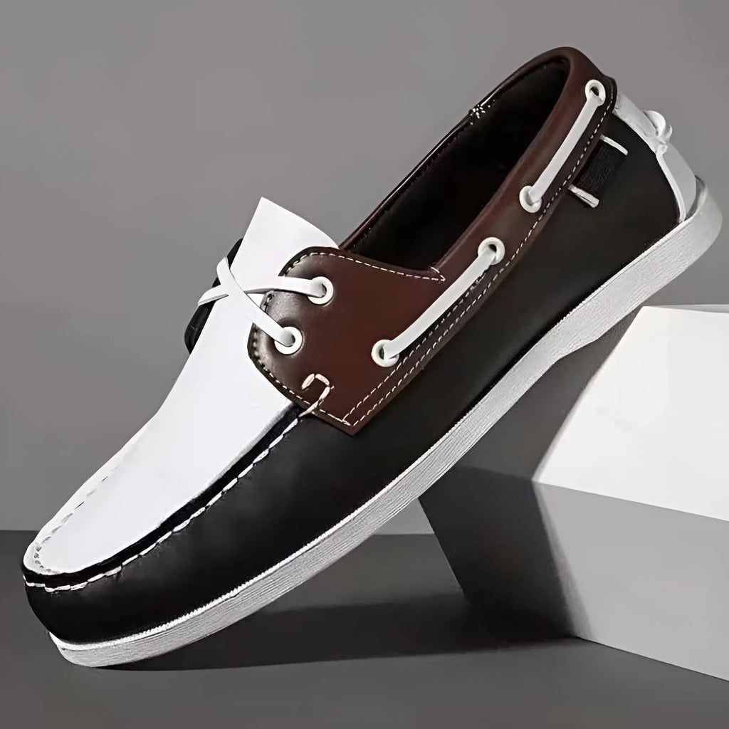 Men's black casual shoes with round toe, flat heel, and lace-up design on a white background.