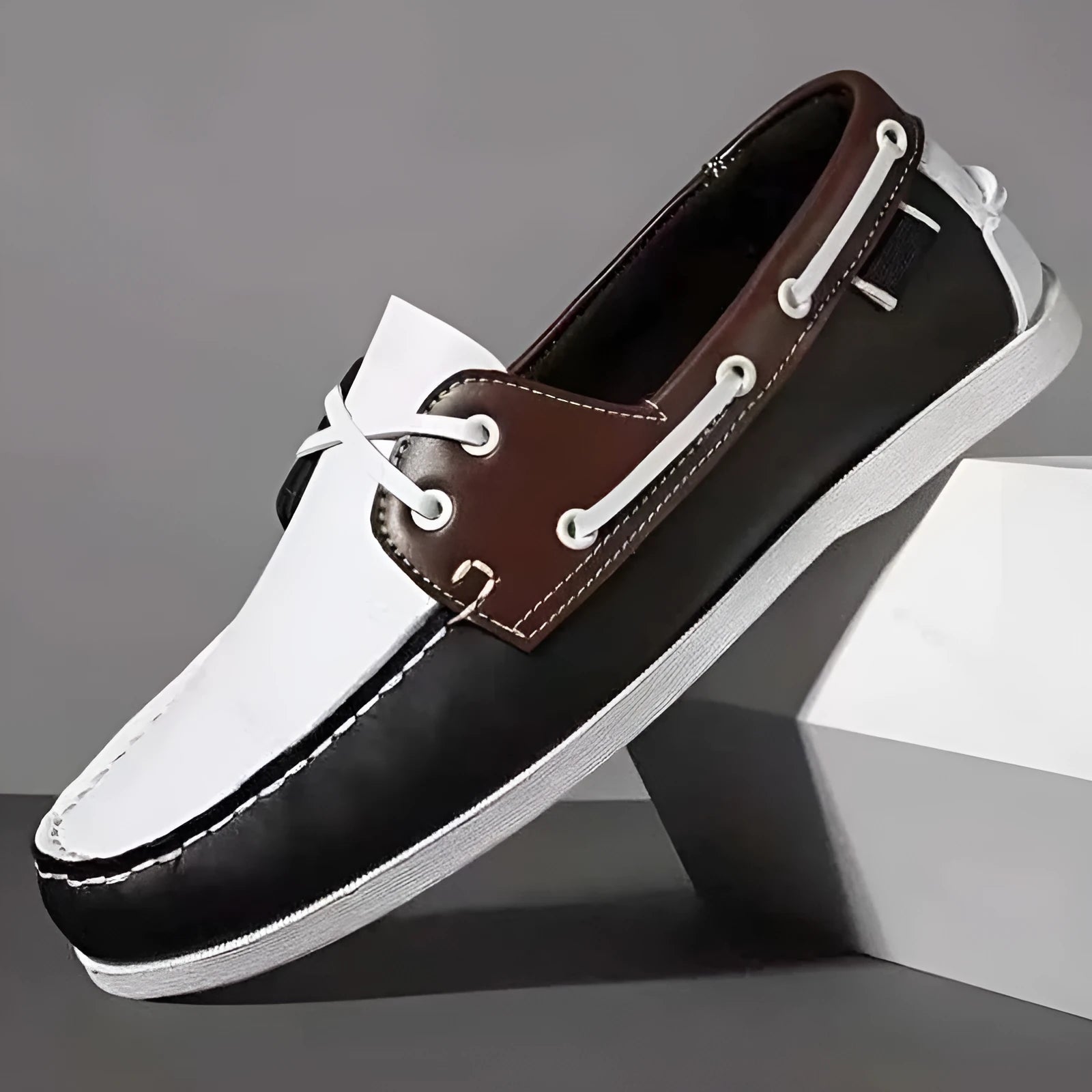 Men's black casual shoes with round toe, flat heel, and lace-up design on a white background.