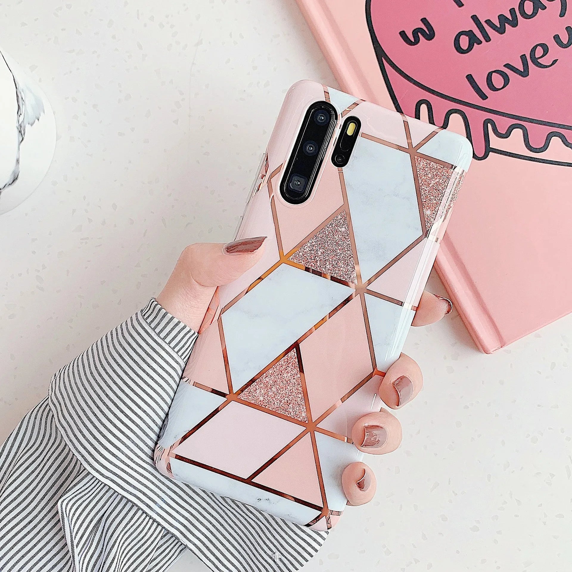 Electroplated marble pattern TPU phone case for Huawei and Samsung smartphones in various colours.