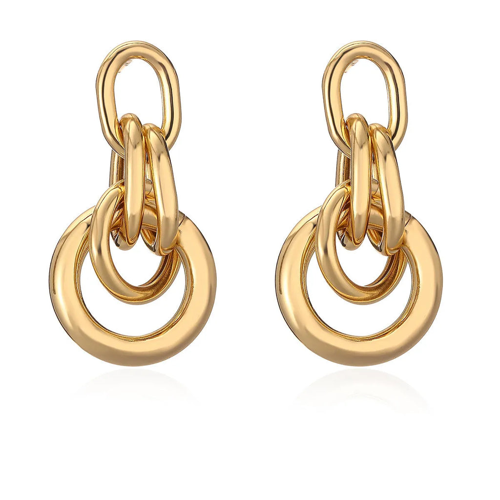 Gold geometric earrings with irregular asymmetric design and INS high-profile styling