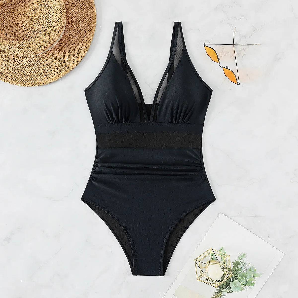 Black women's halter one-piece swimsuit with briefs cut in nylon fabric